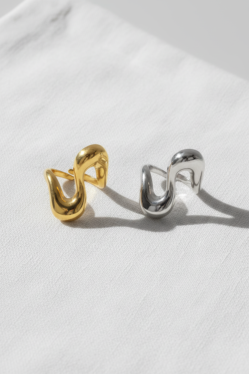 Lumé® Bague Or & Argent — Flat lay lin