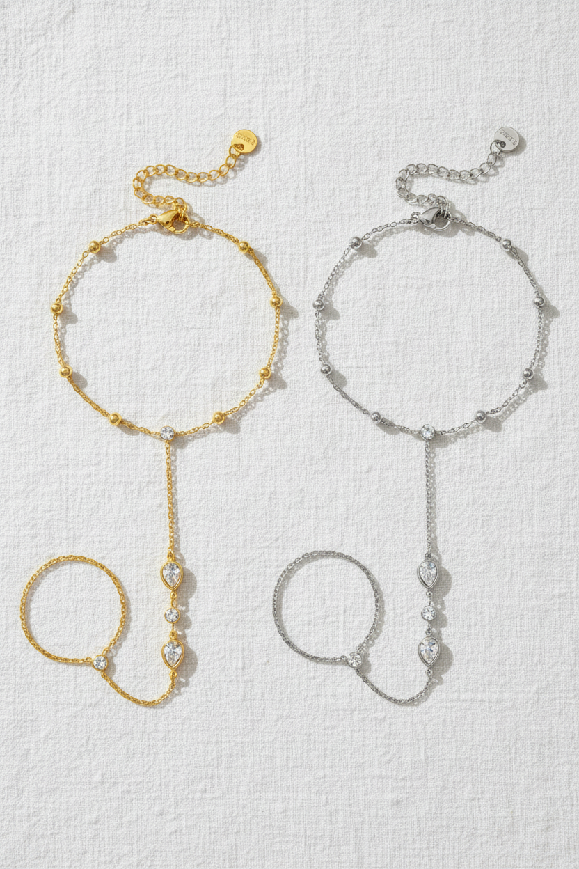 Lumé® Chaîne de Main Or & Argent — Flat lay lin